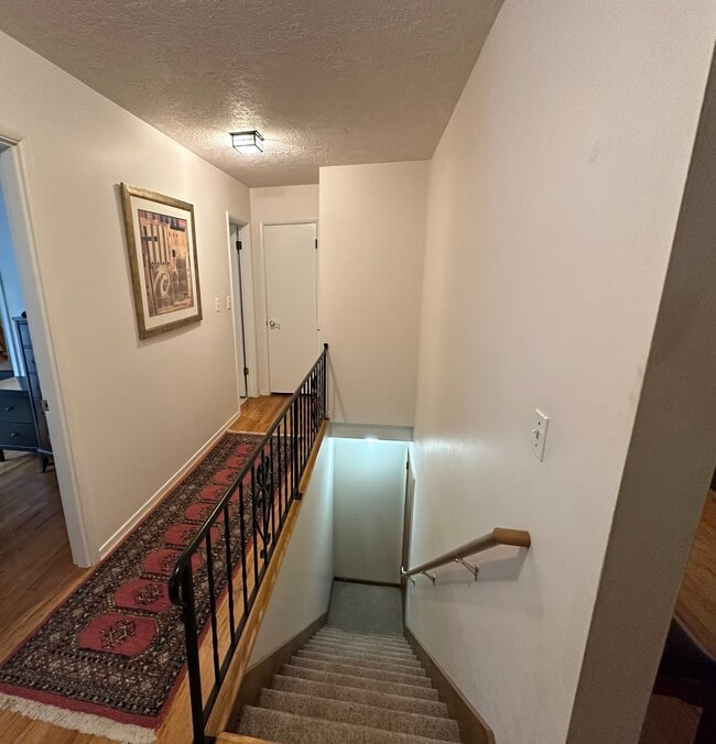 Hallway/garage stairs - 3839 SW Marigold St