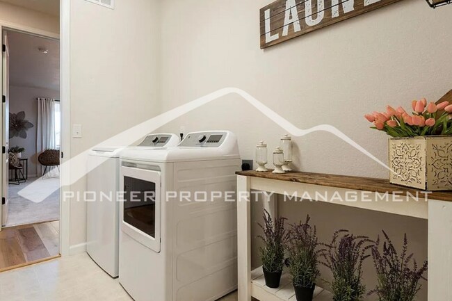 Building Photo - Stylish Main-Level Living with Finished Ba...