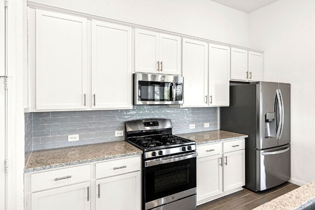 Building Photo - The Perfect Blend of Space, Style, and Community Living