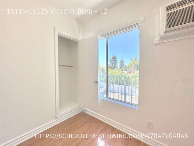 Building Photo - Updated top floor Studio apartment located...