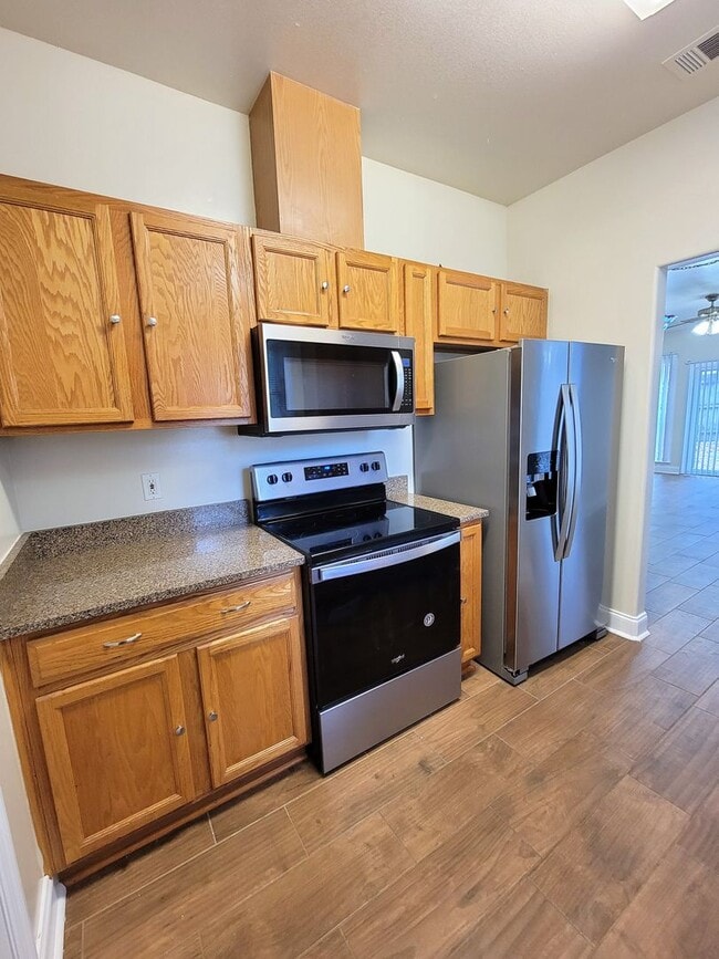 Building Photo - 3 bedroom town home for rent starting June 8, 2026, renting for $1800, includes privacy fenced ya...