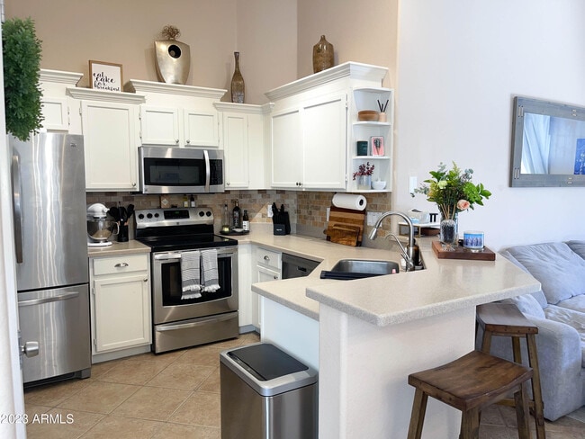 Building Photo - 1077 W Olive Ave