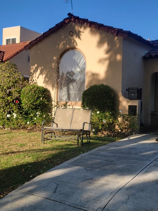 Bench and red rose - 466 S Wetherly Dr