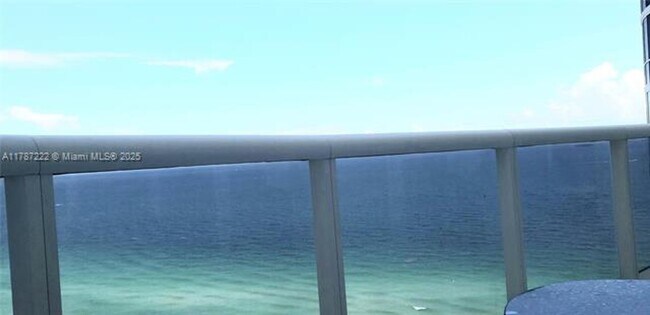 Building Photo - 15811 Collins Ave