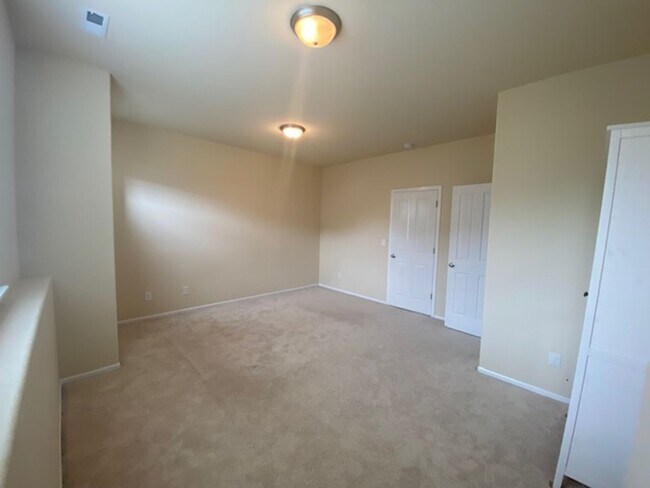 Building Photo - Beautifully Renovated 4 bedroom Home with attached 4 car garage!