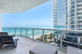 Building Photo - 15811 Collins Ave