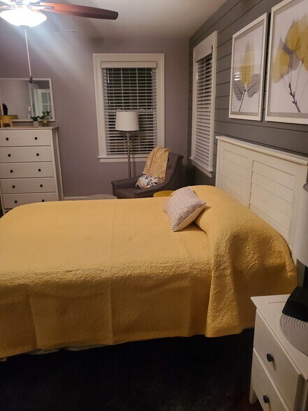 Queen bed in bedroom - 1018 W 45th St