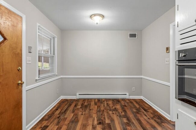 Building Photo - Large Home in Four Seasons Area, Hardwoods, Dining Room, Screed Porch, Fenced!
