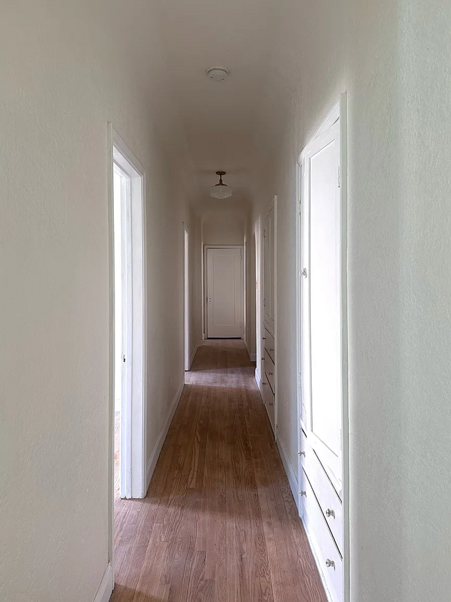 Even the hallway has storage, this property truly feels like a single family home. - 2807 Hillcrest Dr