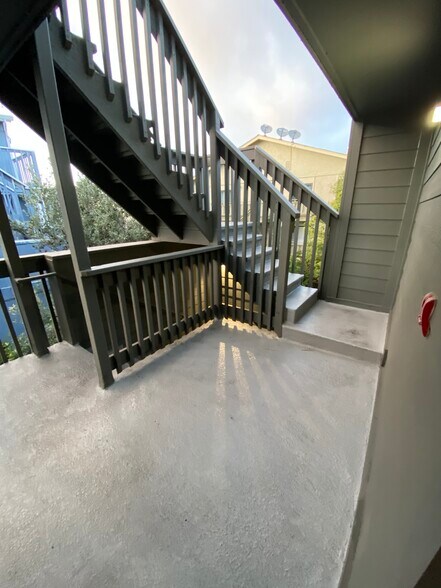 Entry level deck back stairs to shared west facing deck - 445 Willow Ave