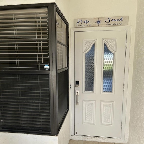 Building Photo - 7716 SE Sugar Sand Cir