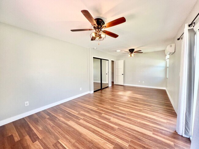 Building Photo - Delightful 3BD/2BA Home with Fruit & Veggie Garden, Back Patio, Solar & In-Unit Laundry