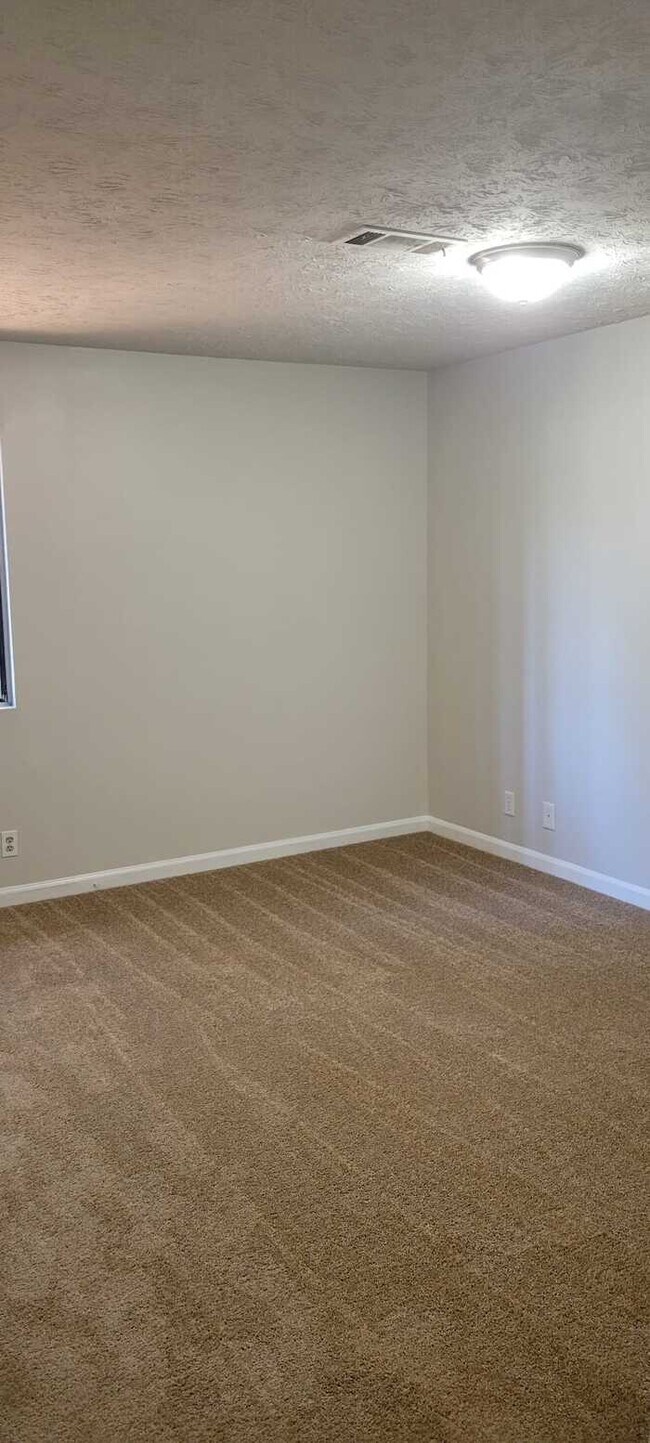 Building Photo - Three Bedroom Split Level Home/Unfinished ...