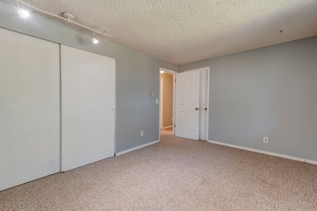 Building Photo - Spacious 4-Bedroom Home with Fireplace, Fenced Yard, and 2-Car Garage