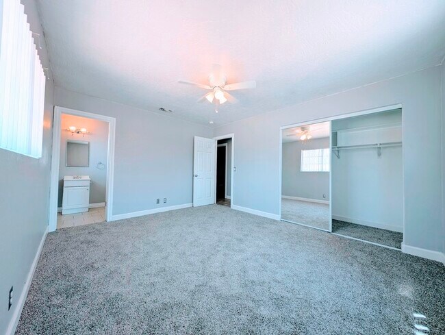 Building Photo - 4 bed with Dual master bedrooms and Solar ...