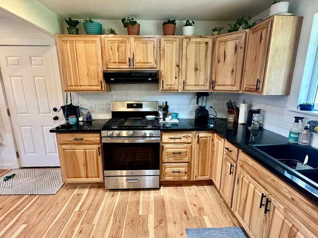 Building Photo - Beautifully Remodeled Home Backing Up to t...