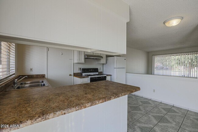 Building Photo - 3020 N 87th Ave