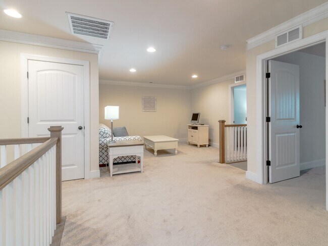 Building Photo - Spacious Furnished 4BR Townhome with First-Floor Owner’s Suite Near Rehoboth Beach - Sawgrass