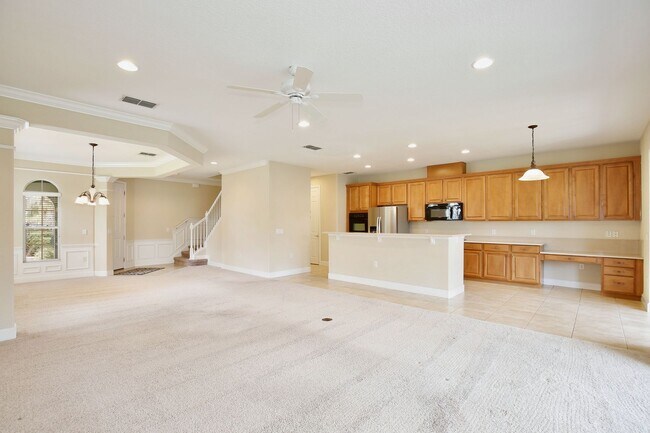 Building Photo - Stylish and Spacious 3/2.5 Townhome with Premium Features and Community Pools