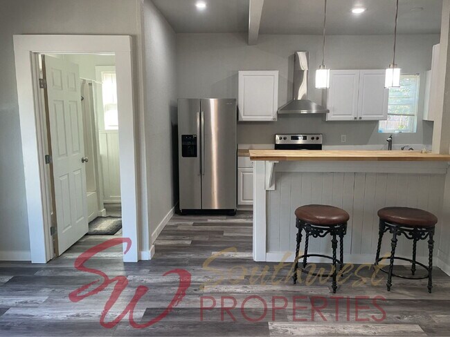 Building Photo - Recently Updated Home with Open Layout + Fenced Backyard!