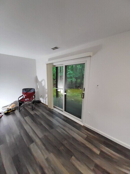 covered patio - facing woods - 23 Stratton Ct