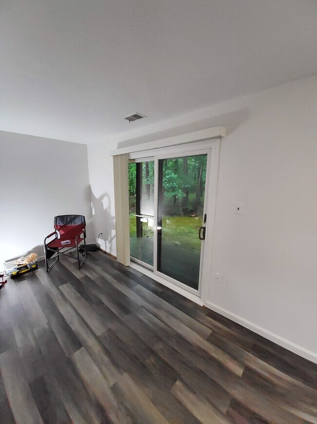 covered patio - facing woods - 23 Stratton Ct