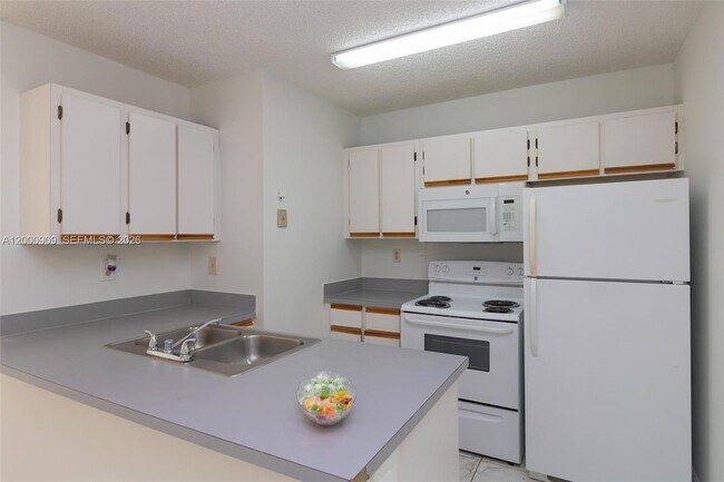 Building Photo - 18304 NW 68th Ave