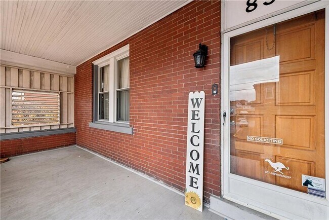 Building Photo - Bright and Roomy 6-Bedroom in McKees Rocks with Garage