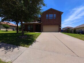 Building Photo - "Spacious 5-Bedroom Oasis with Pool on Gri...