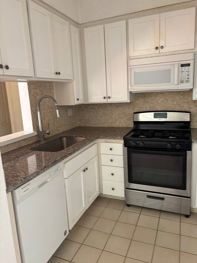 Building Photo - 4441 Woodman Ave