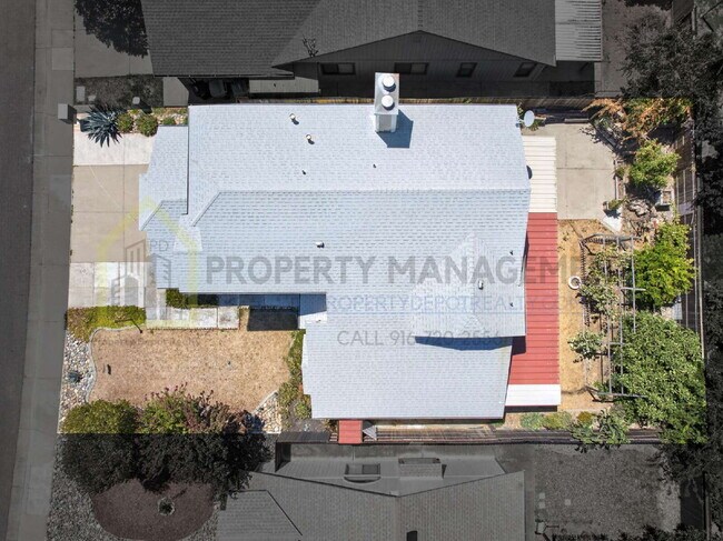 Building Photo - Spacious 4-Bedroom Retreat with 2.5 Baths