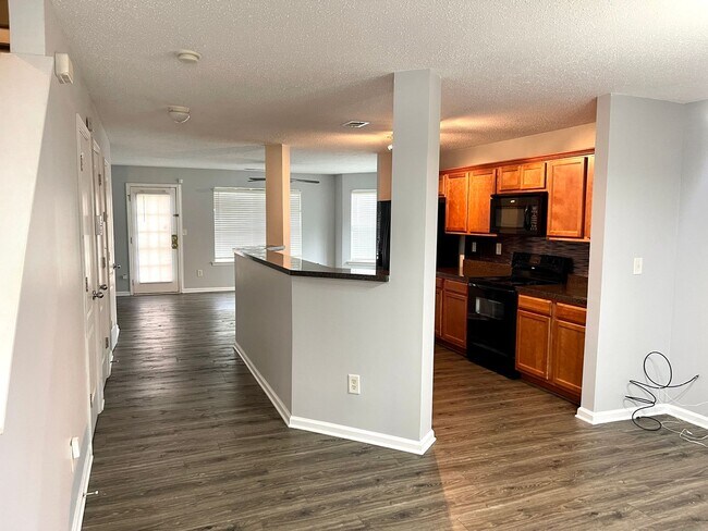 Building Photo - Welcome to this stunning 2-bedroom, 2.5 bathroom corner townhome located in the vibrant city of A...