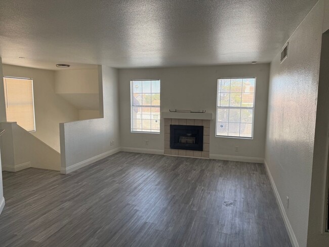 Building Photo - Beautiful 2-Bedroom Condo with Fireplace & Community Pool Near Cheyenne Freeway