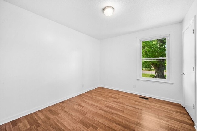 Building Photo - Spacious Yard + Fresh Interior Updates!
