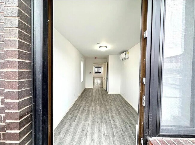 Building Photo - 73-02 Woodside Ave