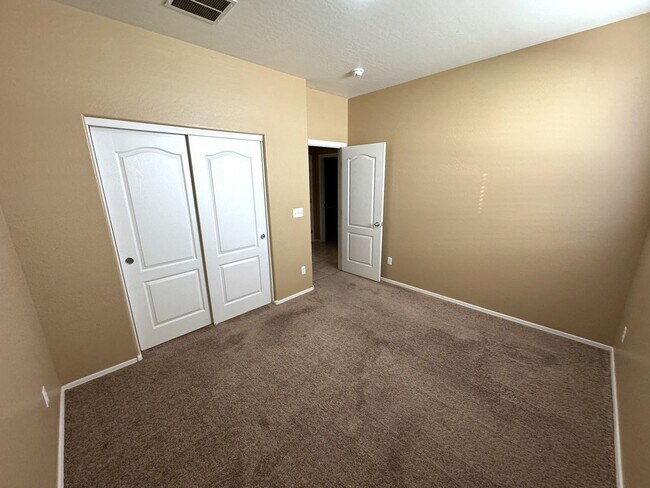 Building Photo - Beautiful 4-bedroom, 2-bath single-story home with Fully Landscaped Backyard