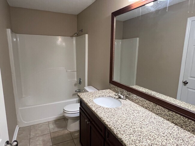 Building Photo - 25% off of 2nd month's rent with a 24 mont...