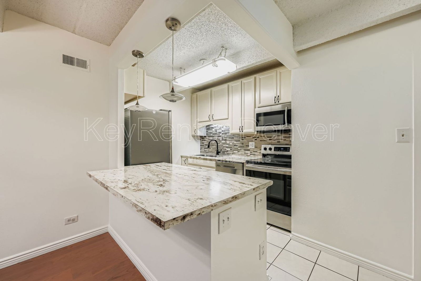 Building Photo - 8060 E Girard Ave