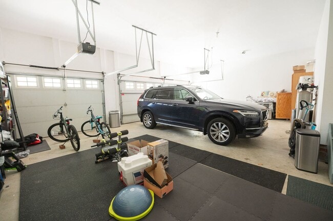 Building Photo - Spacious & Striking 3-story brick Executive 4 bedroom 4.5 bathroom home in Oak Ridge NC + Lawn ca...