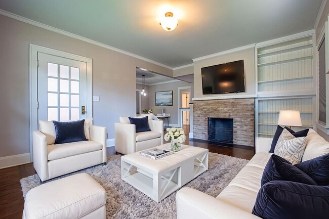 Building Photo - Adorable Brick 4 Bedroom Ranch with Finish...