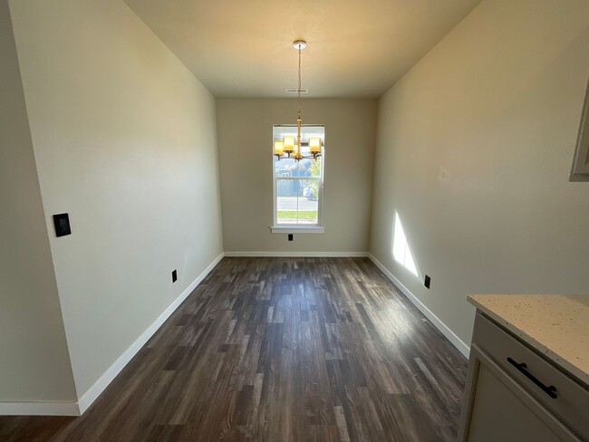 Building Photo - Newly Built 3 Bedroom Home w/ Hardwood Flo...