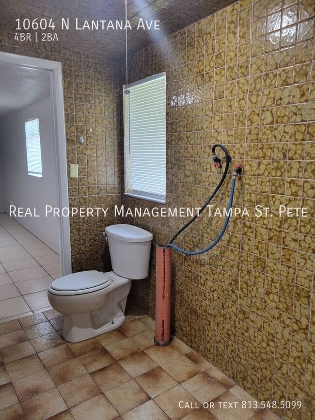 Building Photo - 10604 N Lantana Ave