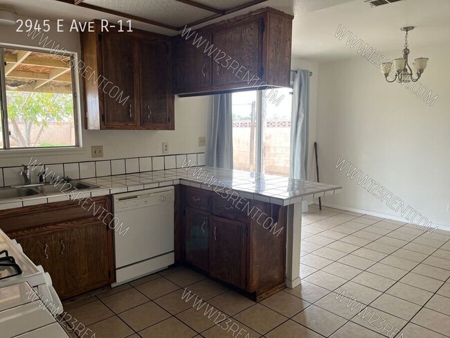 Building Photo - 2945 E Ave R-11