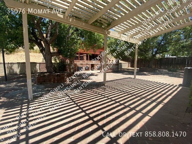 Building Photo - 35076 Momat Ave