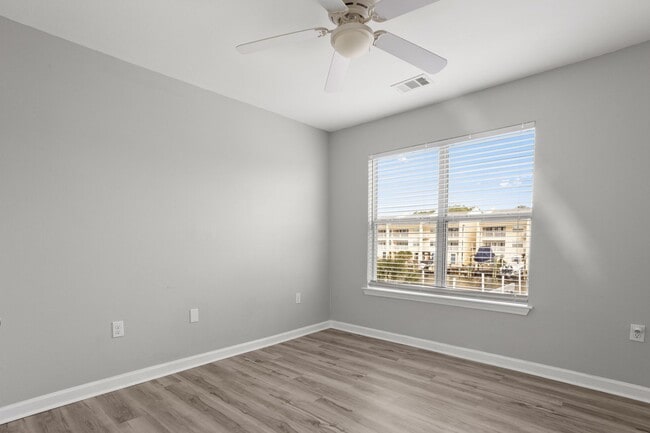 Building Photo - Welcome to Harbor Landing Condominiums — where coastal living meets convenience!