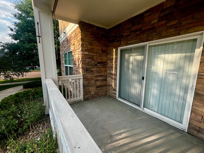 Private Patio with Pull-Down Shade & Storage - 8200 E 8th Ave