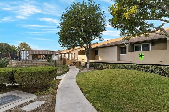 Building Photo - "Charming 1-Bedroom Furnished Retreat with...