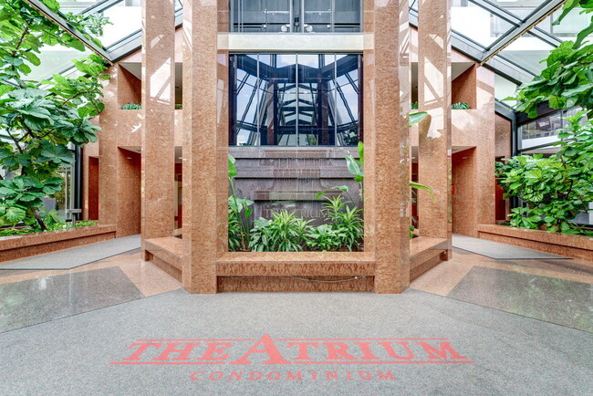 Main atrium greets you upon arrival surrounded by fresh plants! - 1530 Key Blvd