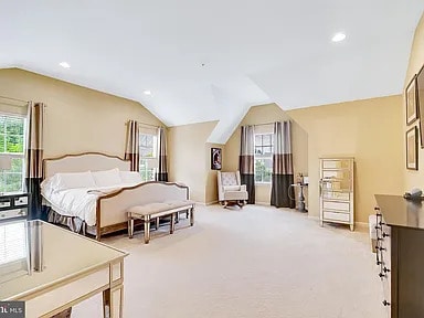 Building Photo - A stunning end-unit carriage home with an ...