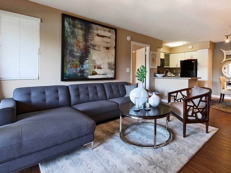 2BR, 1BA - 1,034SF - Living Room - Advenir at La Costa
